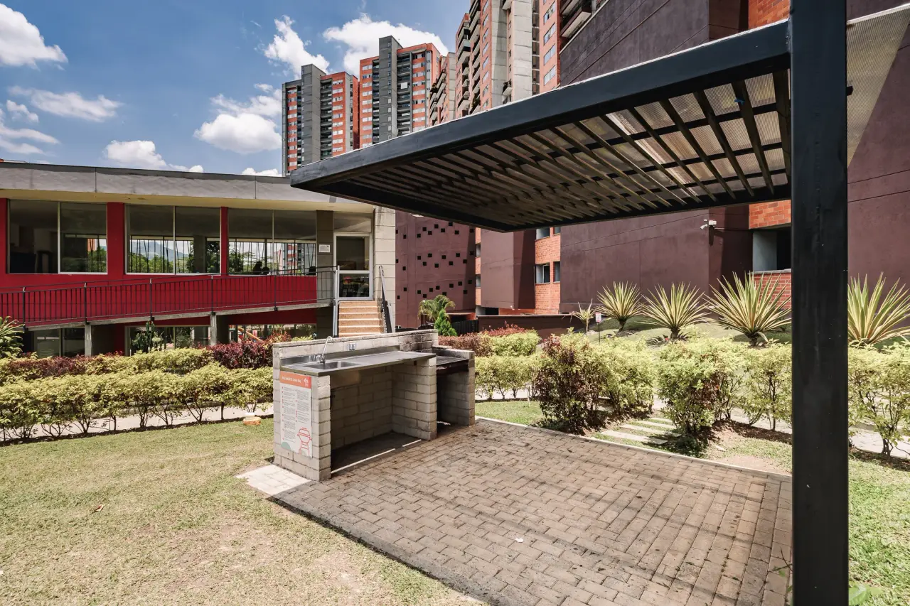 Entrance pergola and gardens at the complex